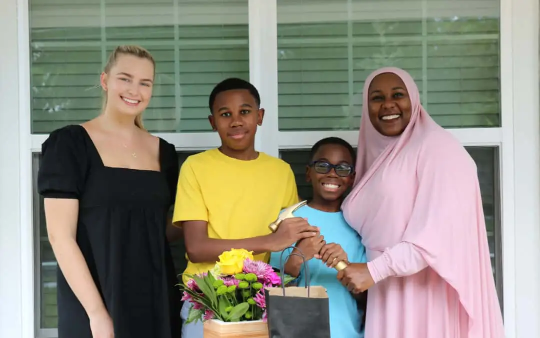 Adrienne marks the completion of her goal of homeownership