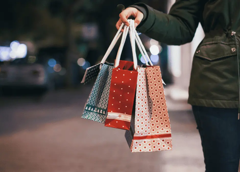 woman carrying shopping bags