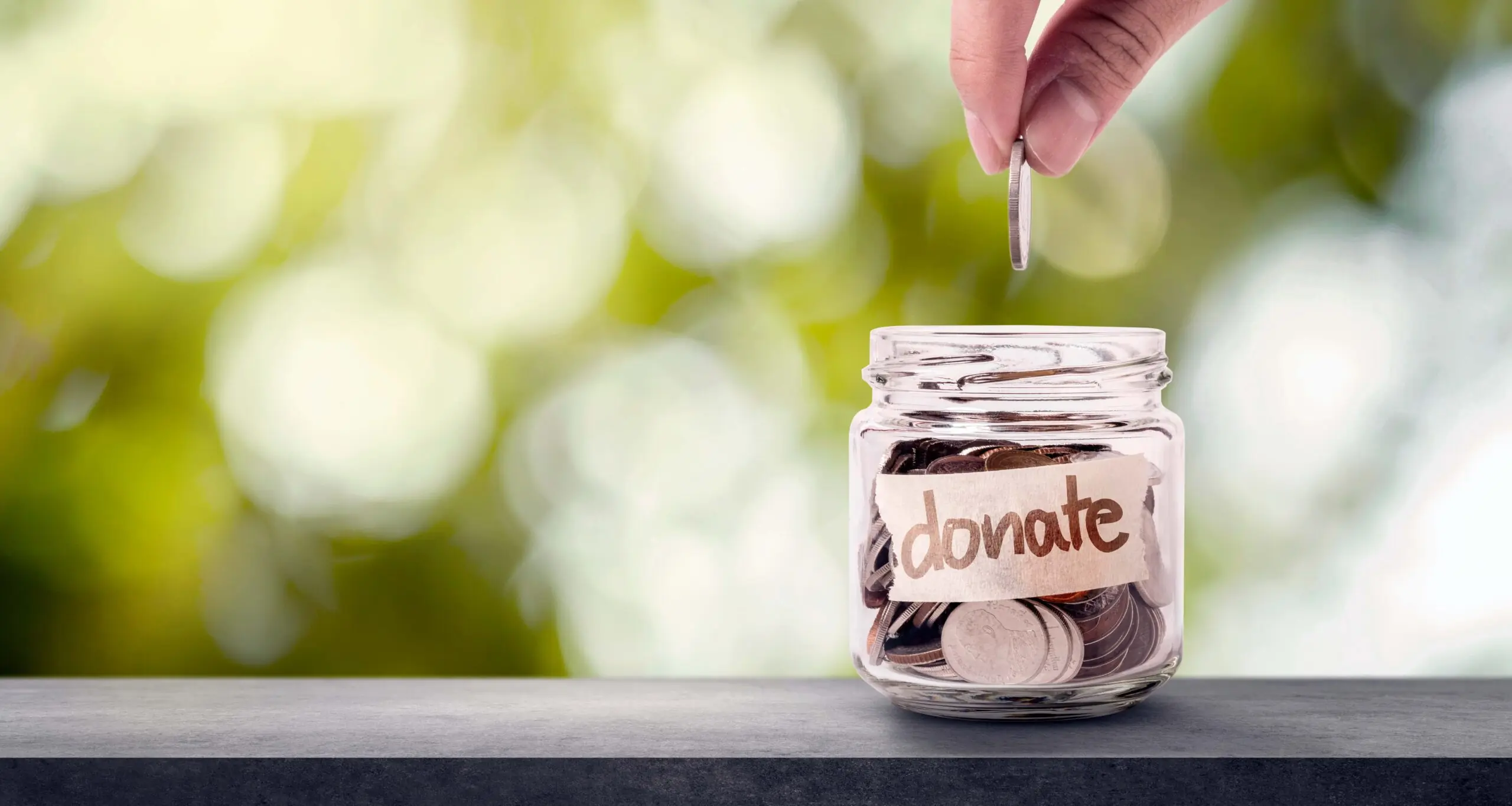 Women smiling  and hugging another woman in her brand new kitchen